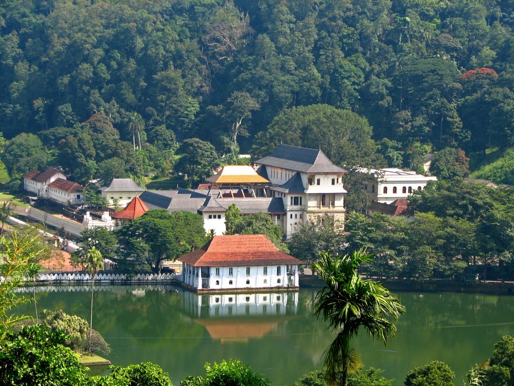 Temple of the Tooth | Image Courtesy:By McKay Savage from Chennai, India (Sri Lanka - 029 - Kandy Temple of the Tooth) [<a href="http://creativecommons.org/licenses/by/2.0">CC BY 2.0</a>], <a href="https://commons.wikimedia.org/wiki/File%3ASri_Lanka_-_029_-_Kandy_Temple_of_the_Tooth.jpg">via Wikimedia Commons</a>